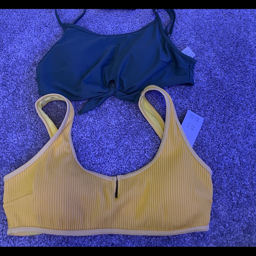 Two hollister bikini tops yellow is brand new with tags green is never worn!